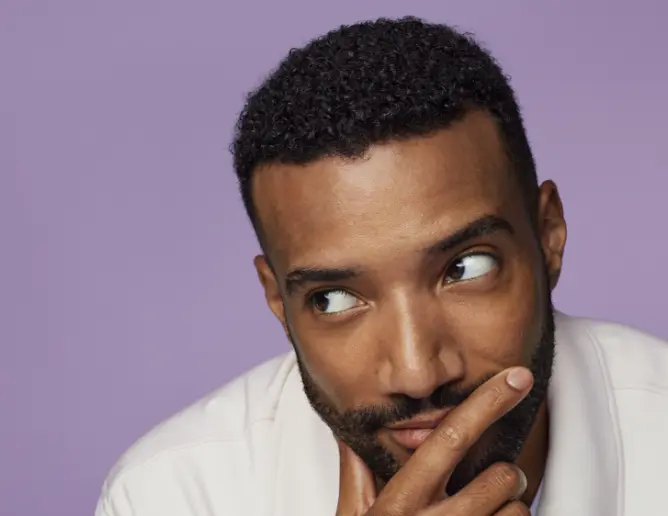 Close up of a man sitting in contemplation