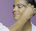 Close up of a woman getting her makeup done