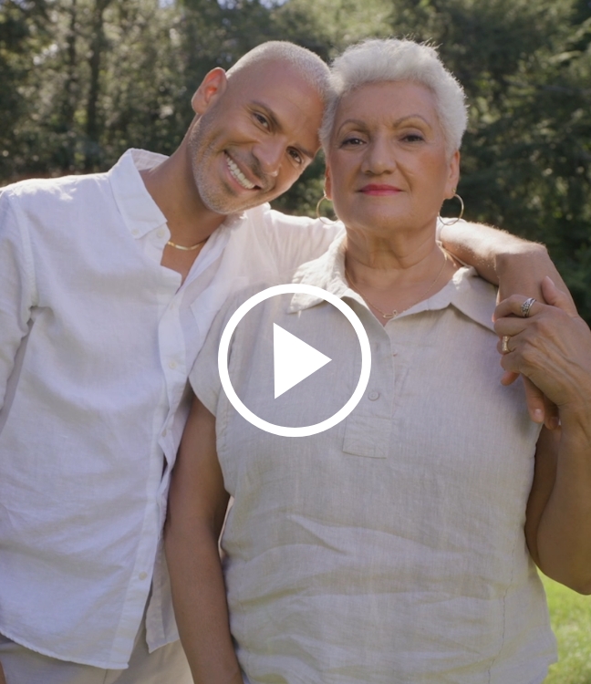 Akbar Gbajabiamila, a man in his mid-40s, looking straight at the camera with a soft smile.