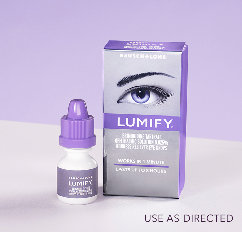 Pair of hands holding up a box of Lumify redness reliever eye drops
