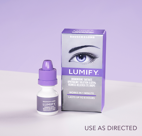 Pair of hands holding up a box of Lumify redness reliever eye drops