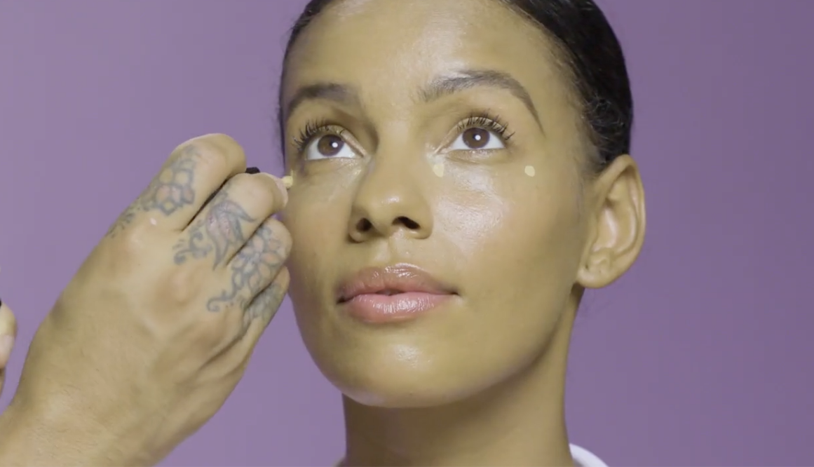 Close up of a woman having her makeup done