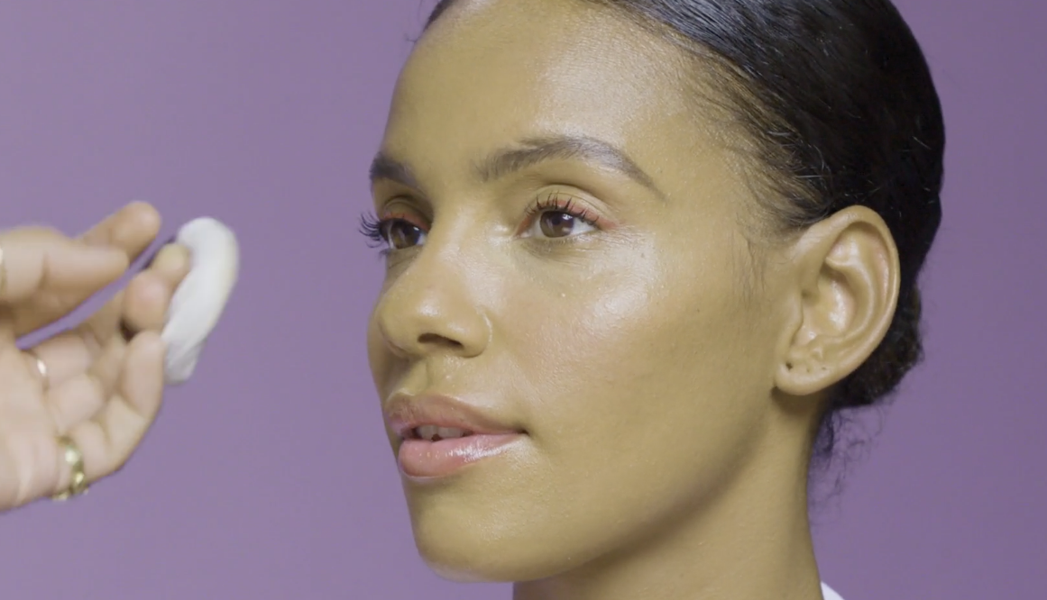 Close up of a woman having her makeup done